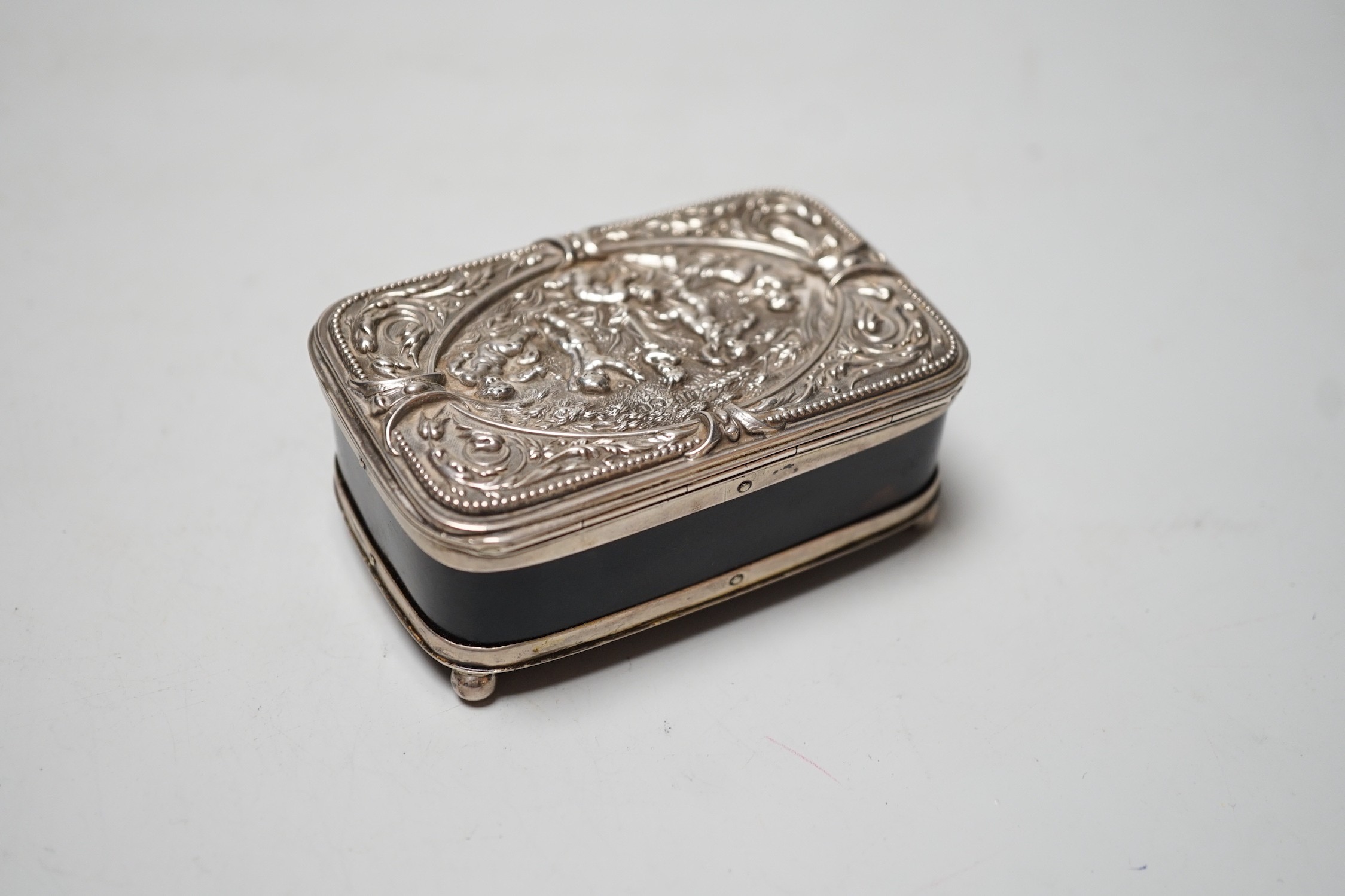 A late Victorian silver mounted tortoiseshell rectangular box and cover, on ball feet, Joseph Braham, London, 1890, 85mm.